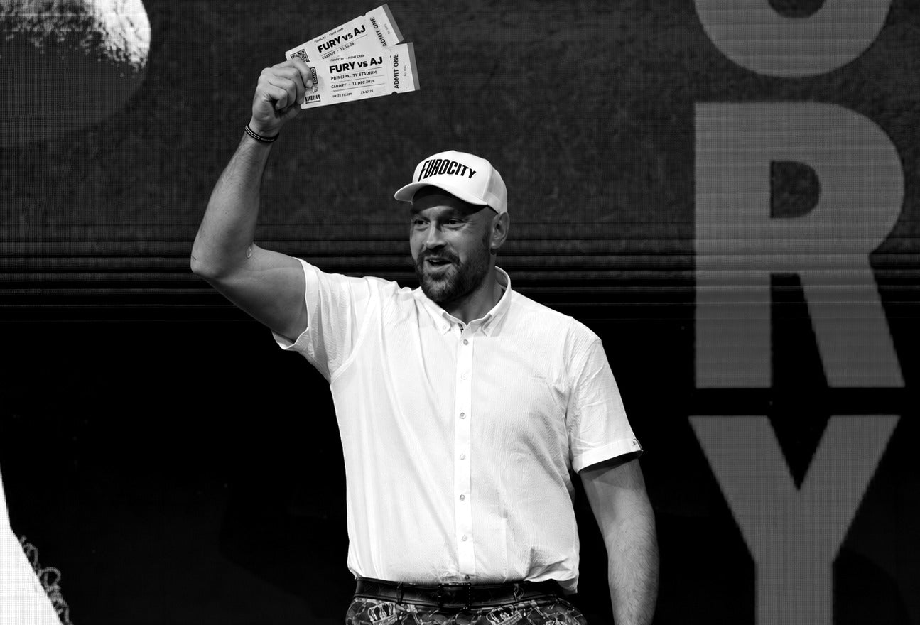 Fury holding up two prize tickets