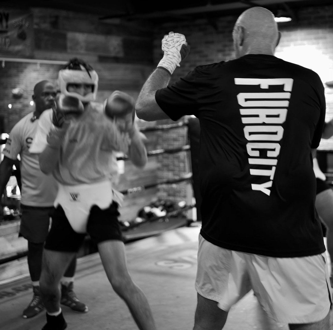 Fury in the ring wearing a Furocity shirt
